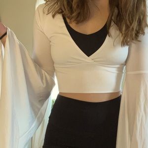 Cropped white bellbottom top